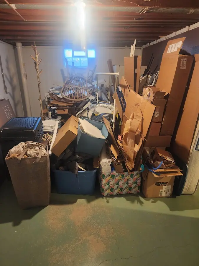 Roll-off dumpster container at job site for Yard Waste Dumpster Rental in Grafton